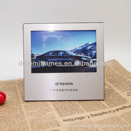 Embossed LOGO photo frame for cars